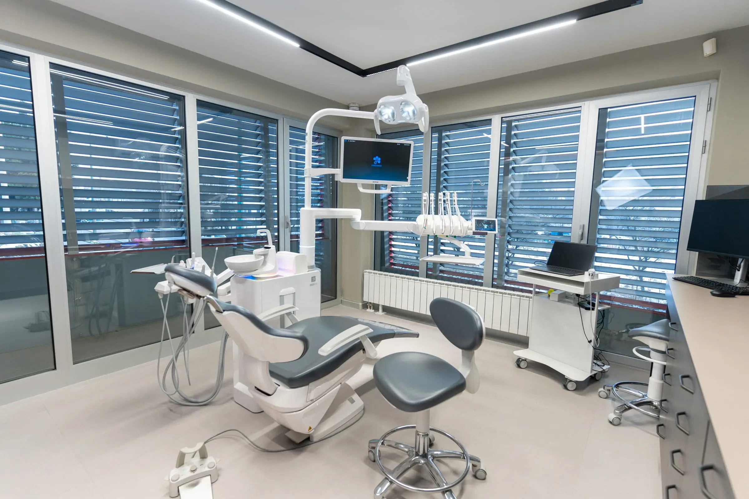 Bright treatment room with large windows