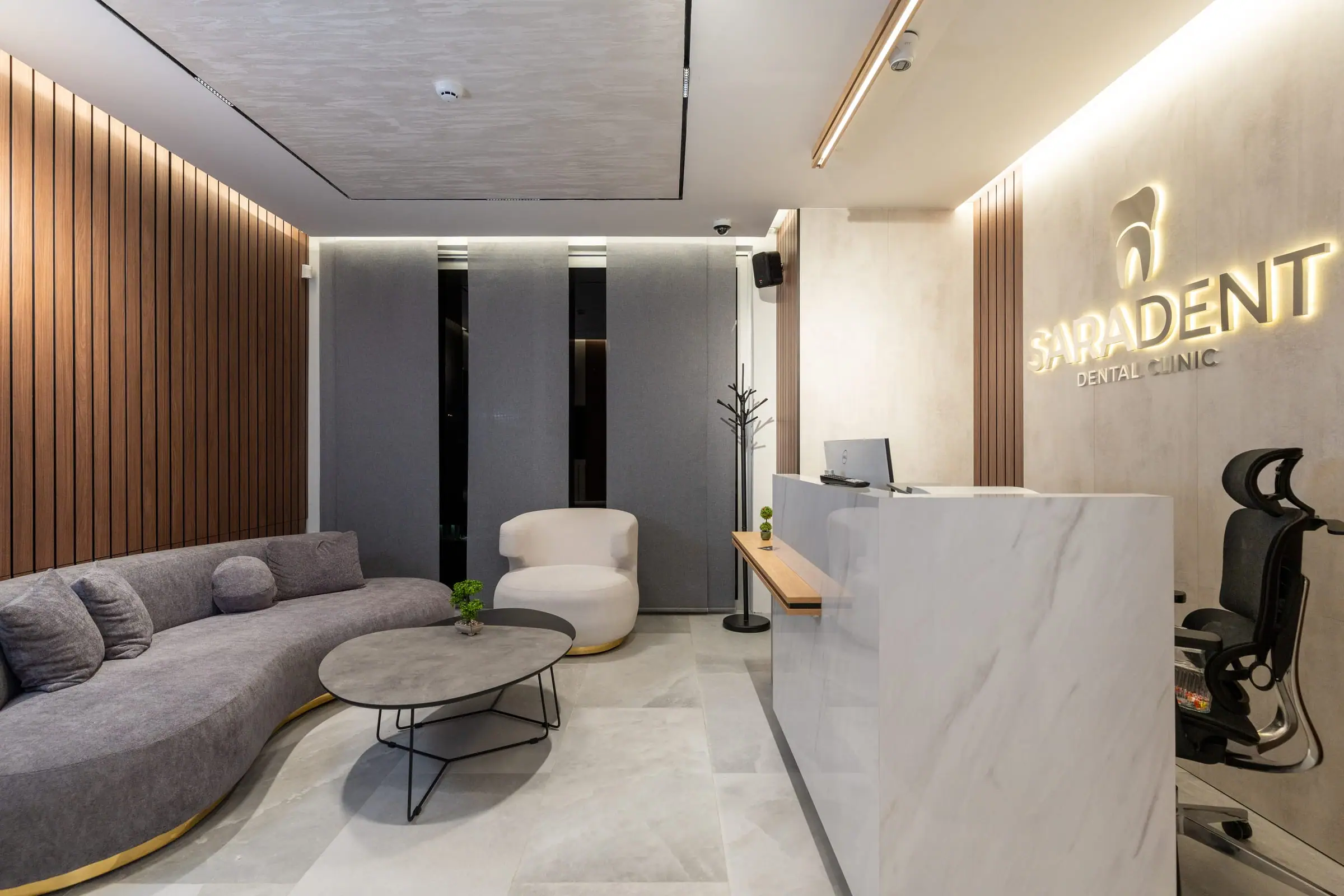 Saradent reception and waiting area with the illuminated logo